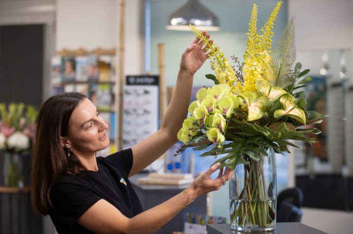 A Floral Image designer flower arrangement in a client workplace